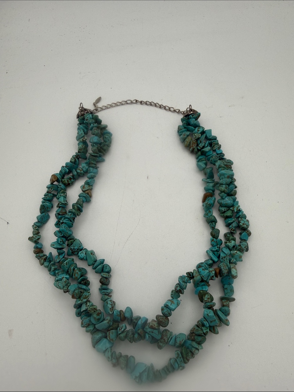 VTG Esmor three-strand turquoise chip faux stone w/ silvertone accent necklace.
